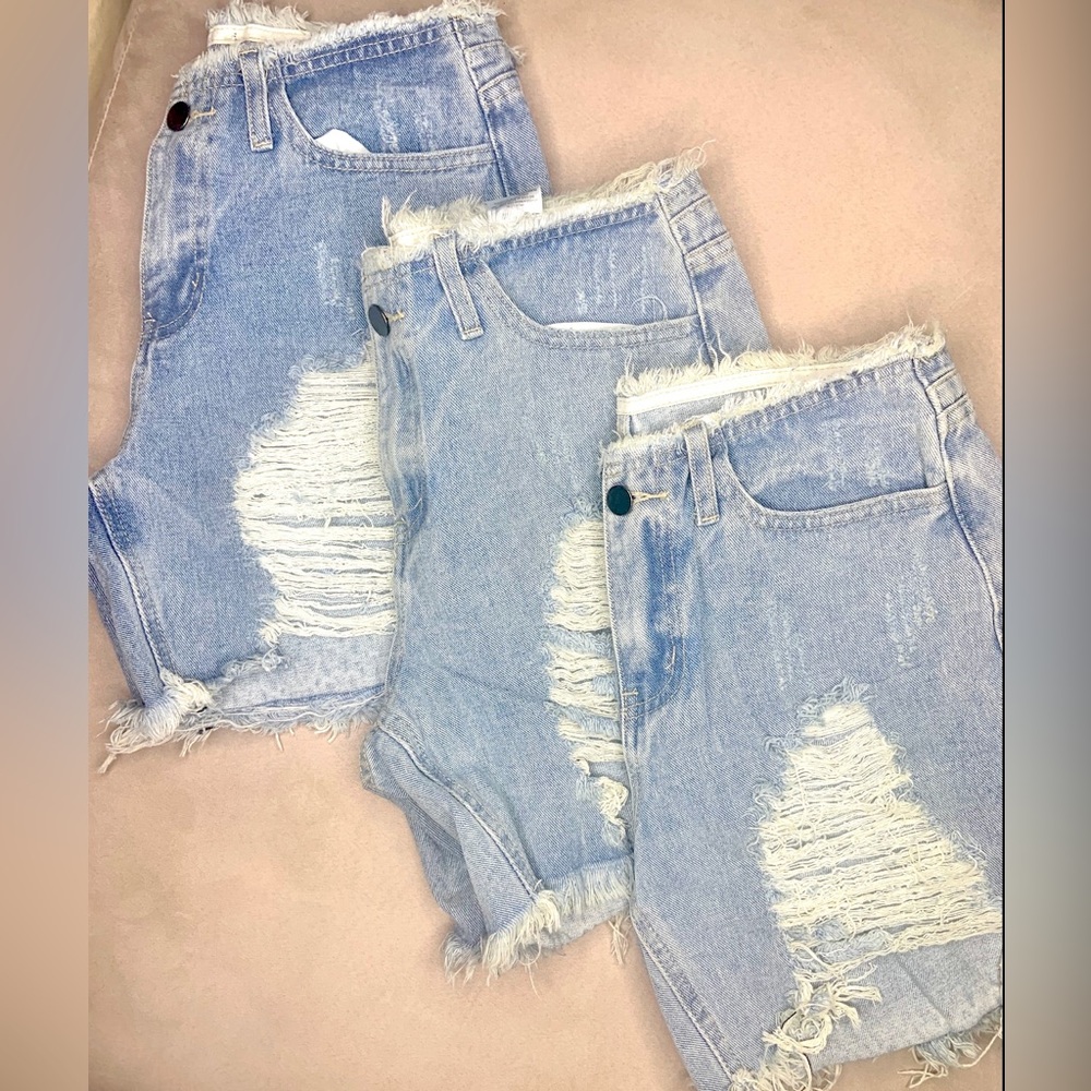 Distressed Blue Jean Shorts. Sizes S-L.